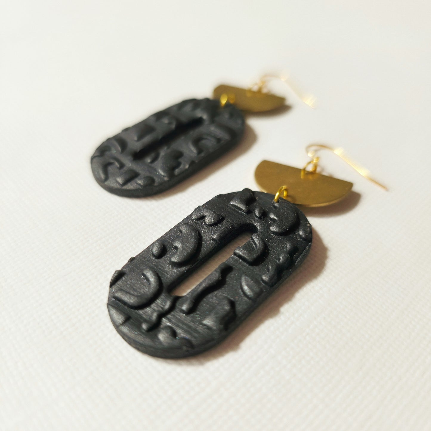 Metallic Textured Black Ovals with Brass Accent